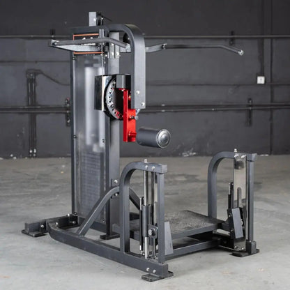 Selectorized multi-hip machine with gray frame, red weight selector stack, and textured foot platforms. Machine features dual foot attachment arms and adjustable positioning for hip and glute exercises.