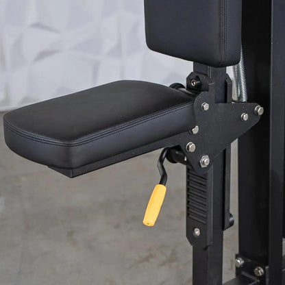 Padded arm rest and seat attachment on a black selectorized pec and rear delt combo machine with metal bracket hardware and yellow adjustment handle.