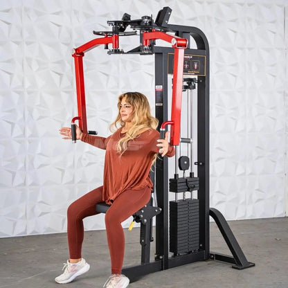 Woman performing a chest press exercise on a red and black selectorized pec and rear delt combo machine with weight stack storage visible on the side.