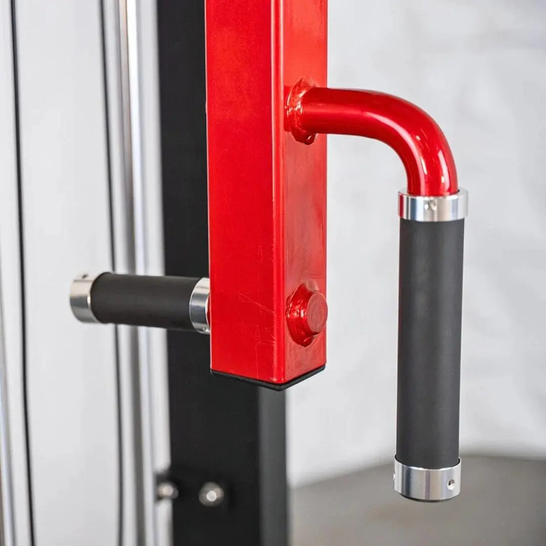 Red and black selectorized pec and rear deltoid combo machine with curved red handles and chrome accents on vertical frame.