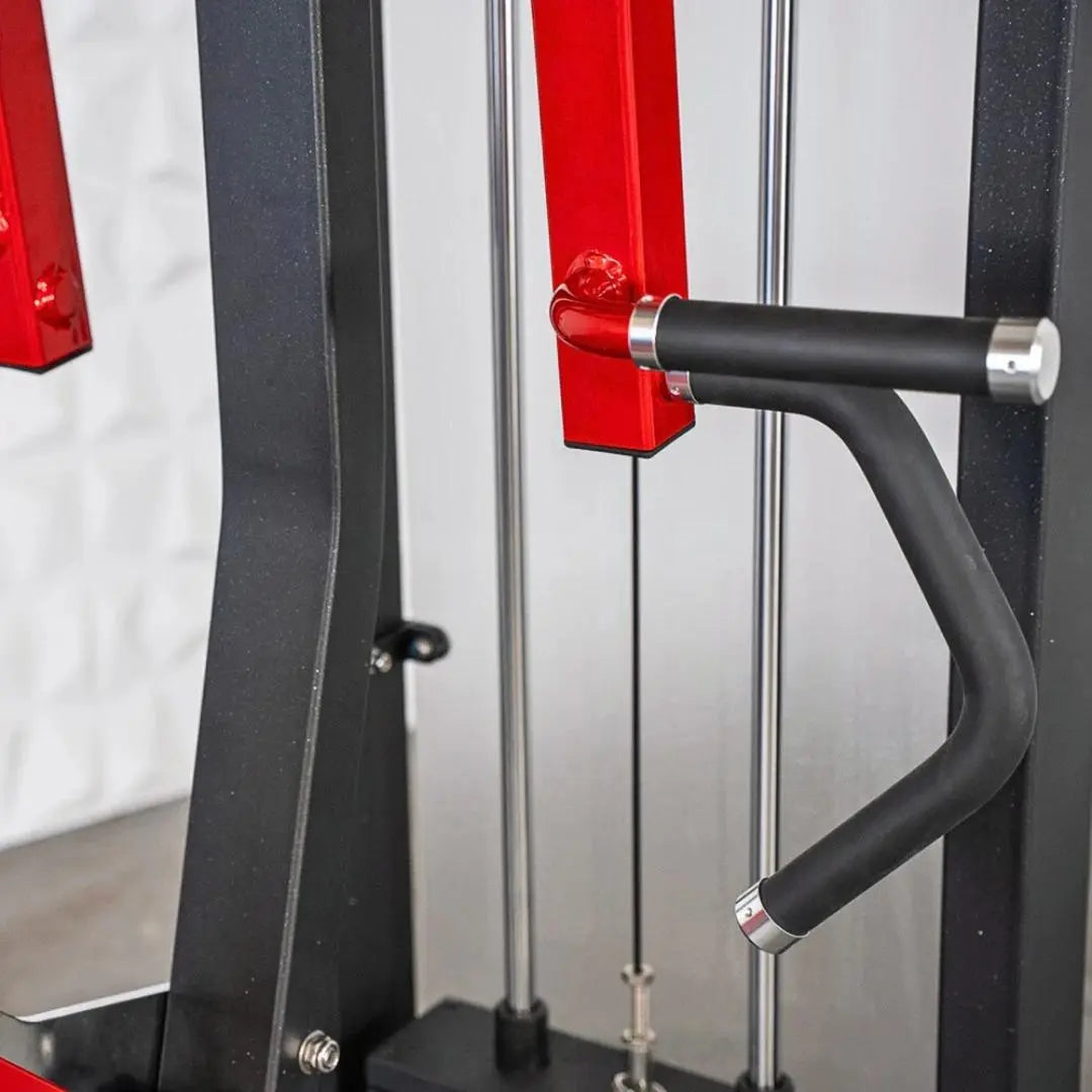 Close-up of a black padded handle with red bracket attachment on a seated row machine with vertical steel guide rails.