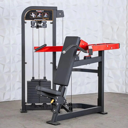 Black and red commercial shoulder press machine with selectorized weight stack, padded seat, and instruction graphics on the frame.