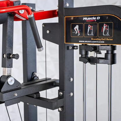 Muscle D Classic selectorized standing calf raise machine with black frame, red upper handles, and instruction placard showing three exercise variations.