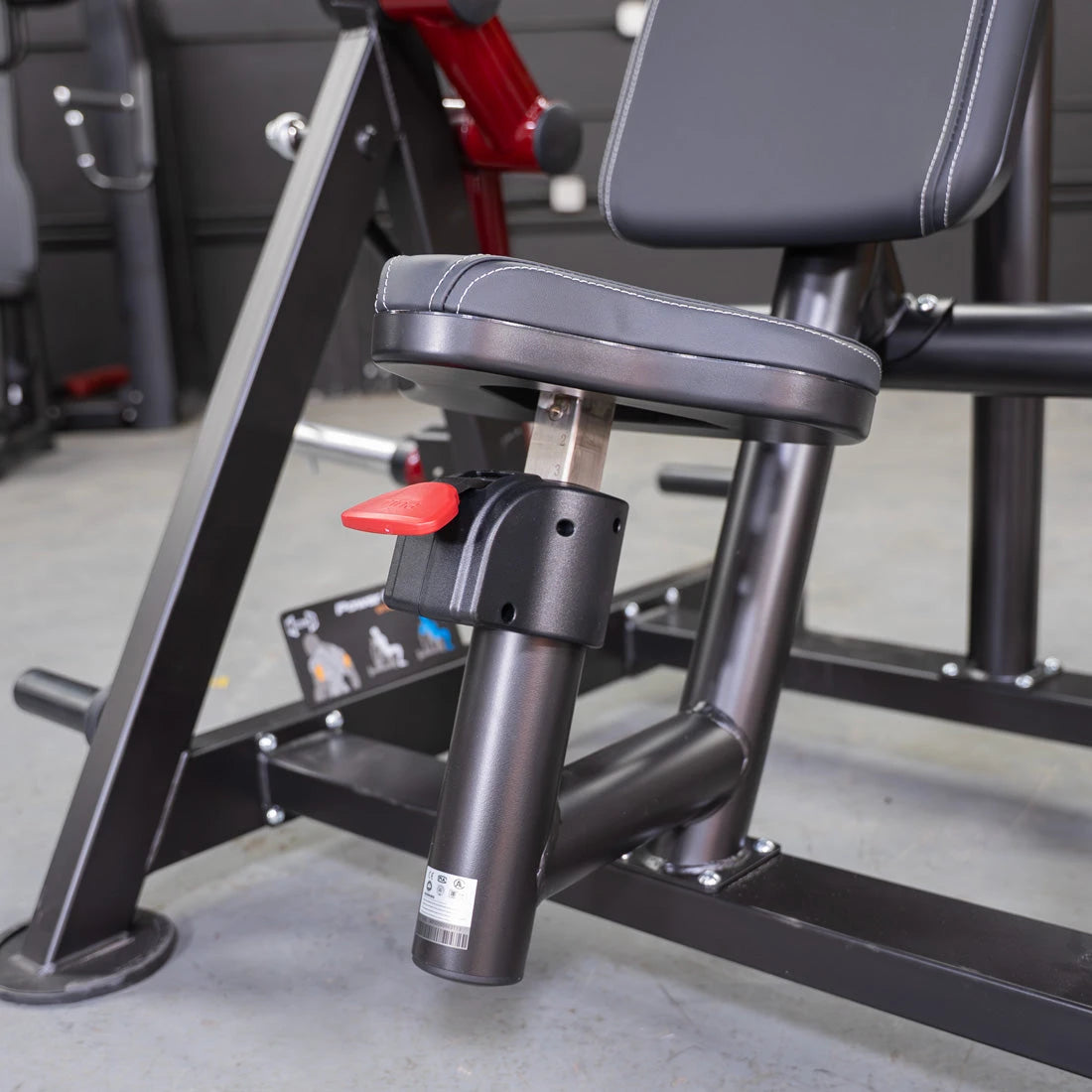 Power Leverage V2 hammer-grip triceps machine with padded seat.