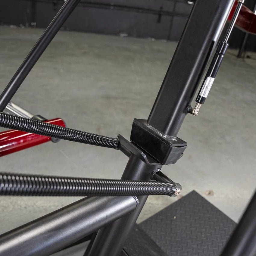 Close-up of Power Leverage Pendulum Squat Machine frame with springs.