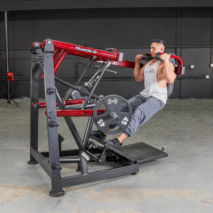 Man performing squats on the Muscle D Power Leverage V2 Pendulum Squat Machine.