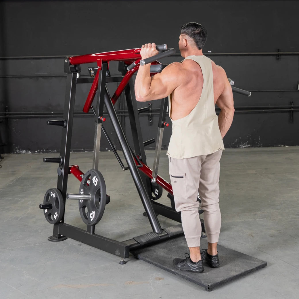 Man using Muscle D Fitness Power Leverage Viking Press Calf Machine in gym.