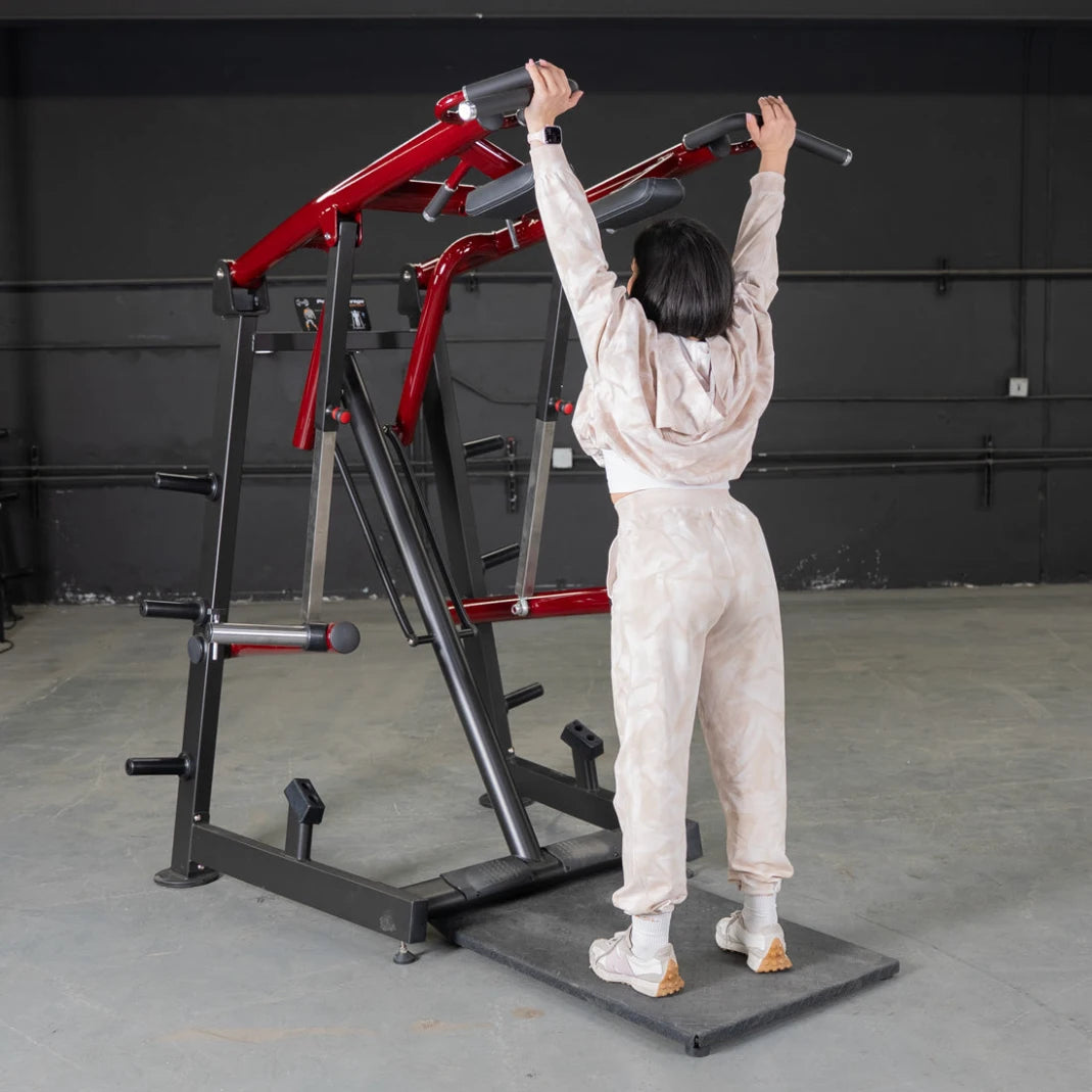 Person using Power Leverage Viking Press Calf Machine in gym.