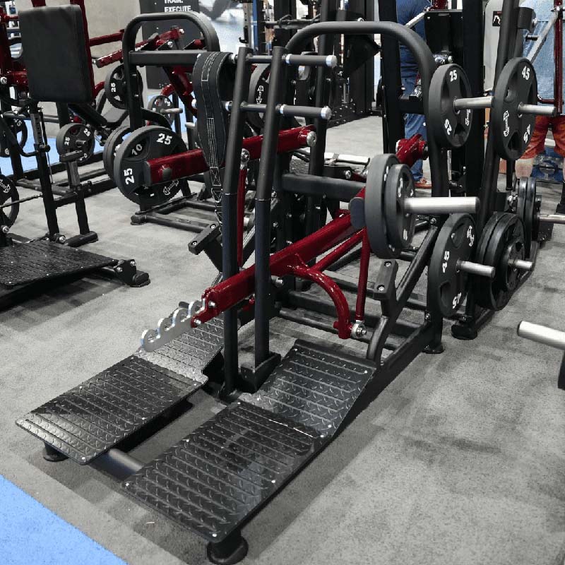 Muscle D Fitness Pro Strength belt squat machine with weight plates.