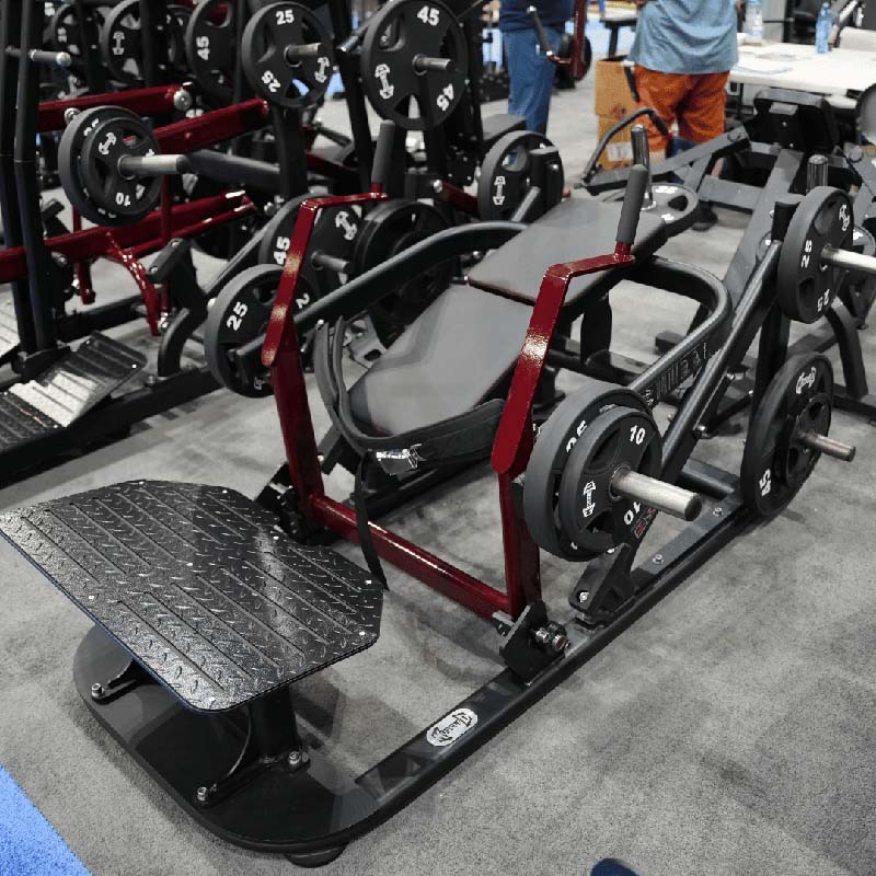 Muscle D Fitness Pro Strength hip thrust machine with weight plates.