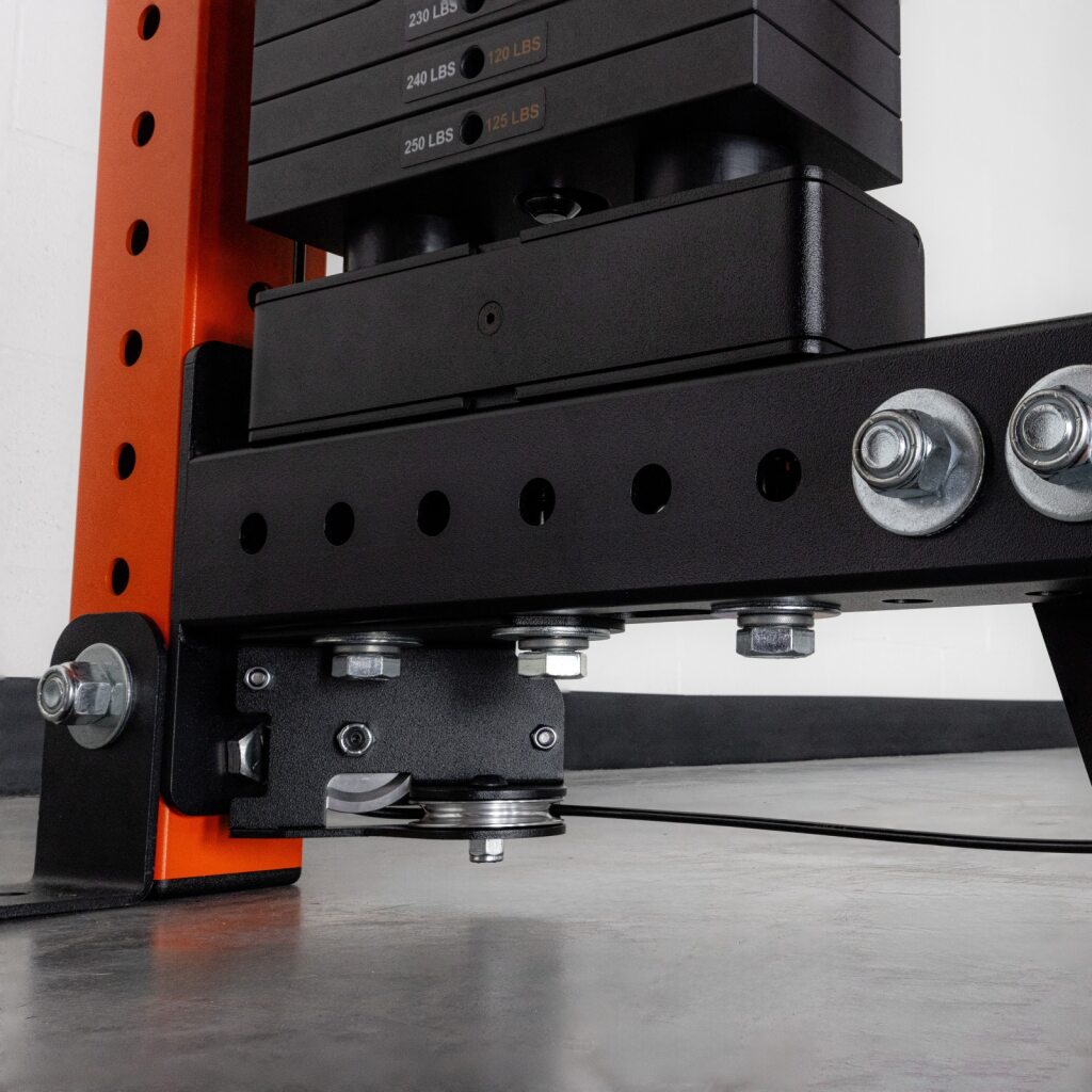 Low-angle shot of a heavy weightlifting rack and plates.
