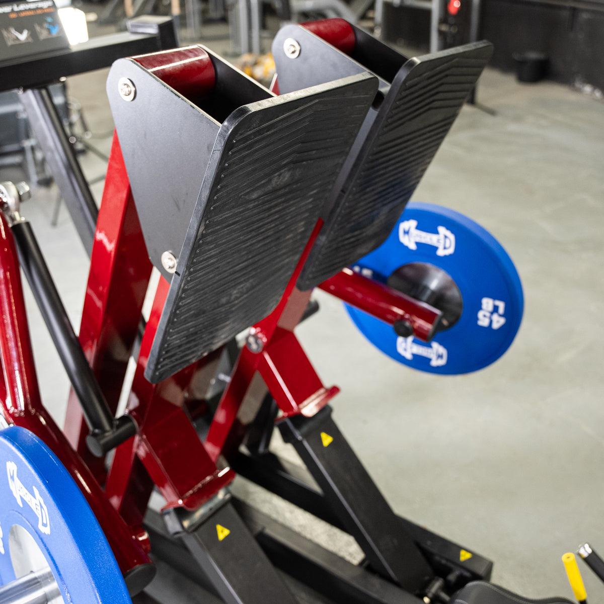 Power Leverage V2 45-Degree Iso Lateral Leg Press with blue weight plates