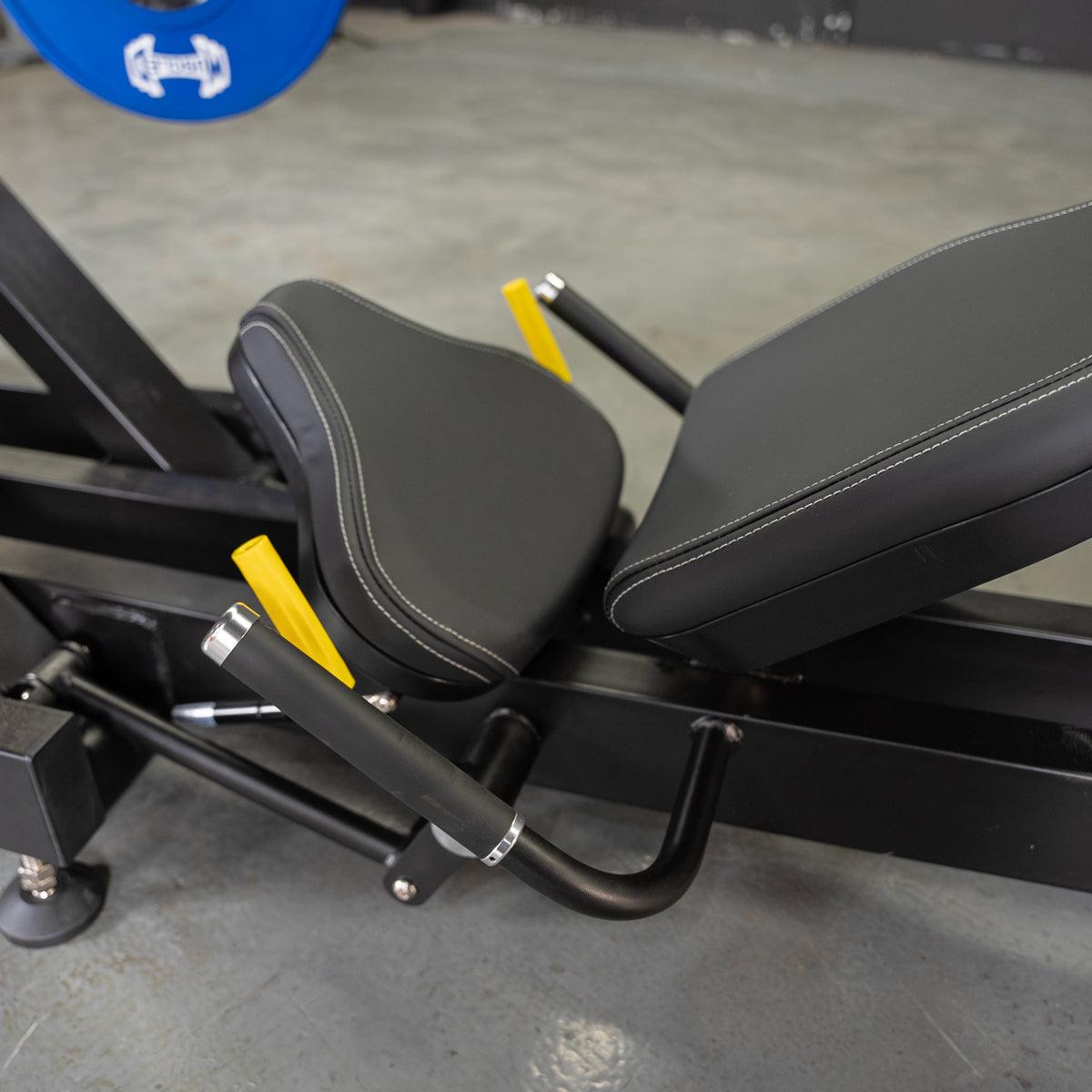 Close-up of Power Leverage V2 45° Iso-Lateral Leg Press machine seat and handles.