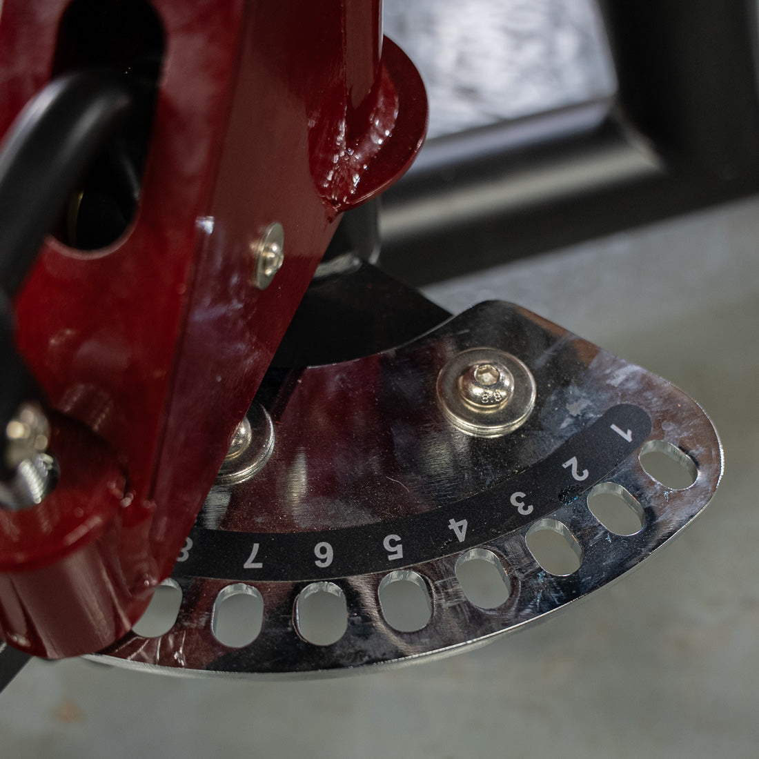 Power Leverage V2 Abductor/Adductor with numbered 1–7 dial and bolts.