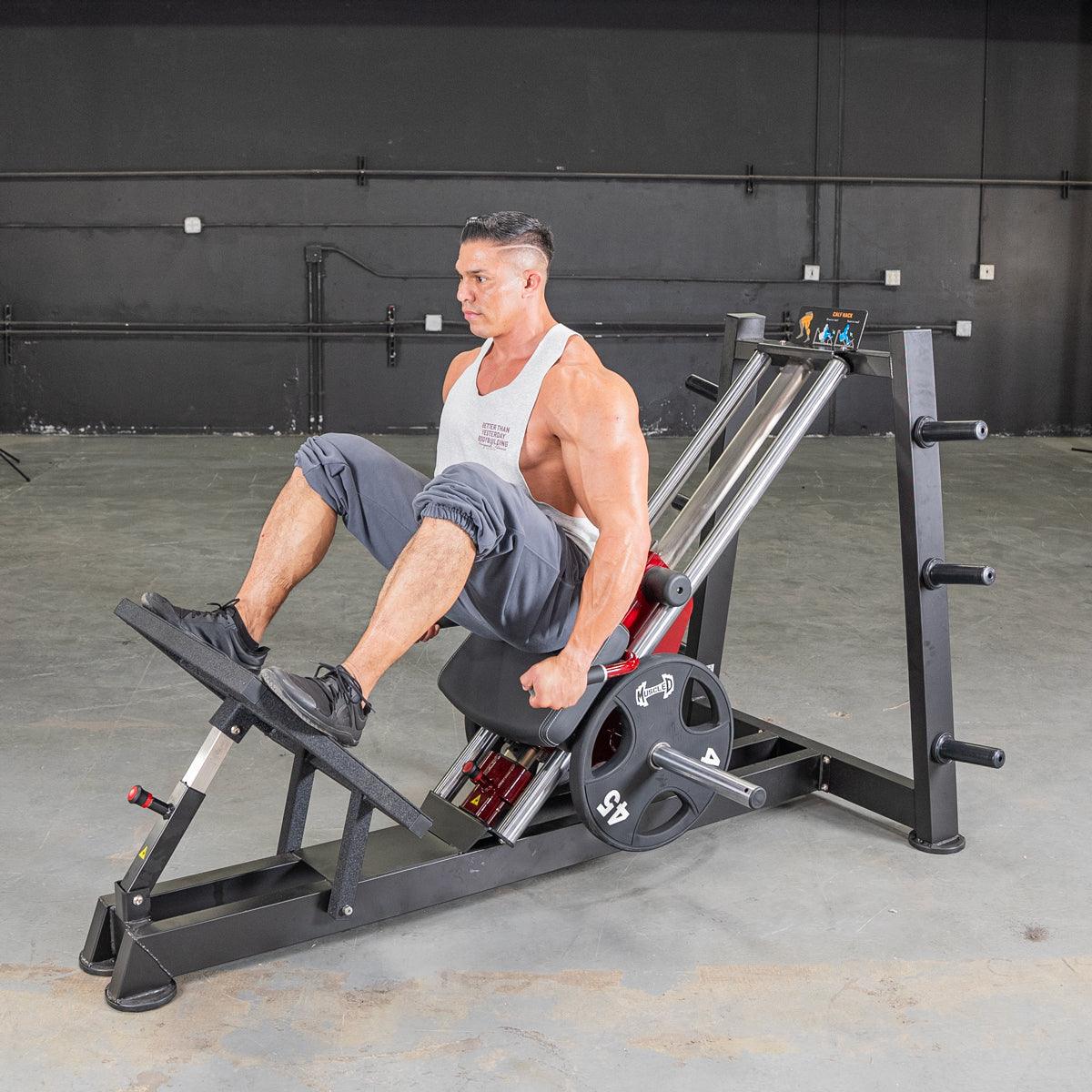 Athlete on a Power Leverage hack squat/calf raise machine in a gym.