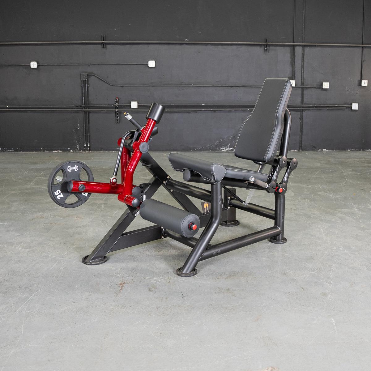 Power Leverage V2 leg extension machine with red frame and black padding.