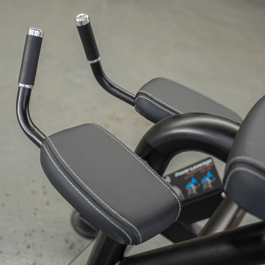 Power Leverage V2 Reverse Hyper handles with padded arm rests.