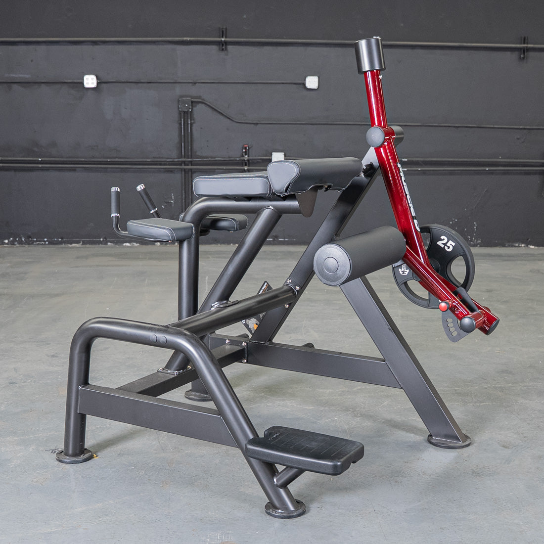 Power Leverage V2 Reverse Hyper machine in a dark gym setting.