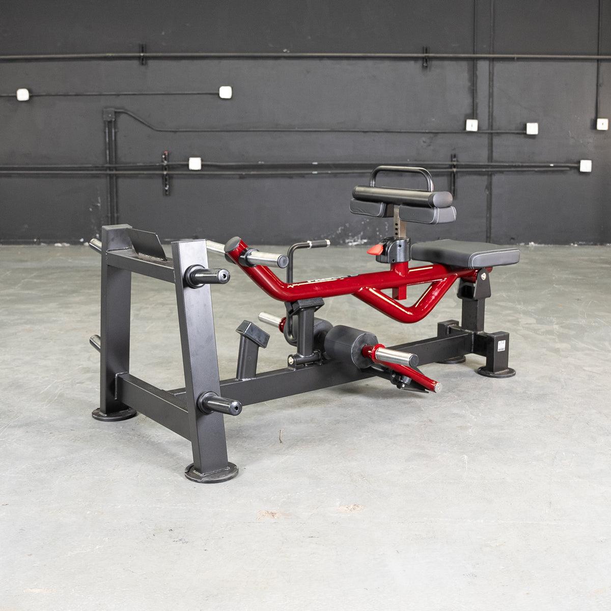 Power Leverage V2 seated calf raise machine in gym.