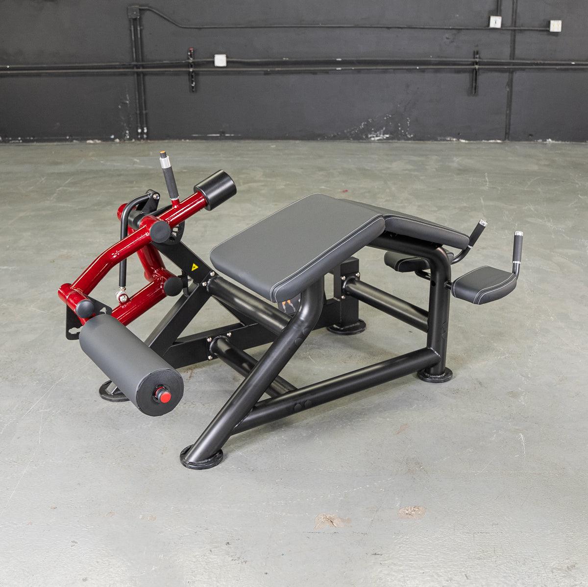 Power Leverage V2 prone leg curl machine with padded bench.