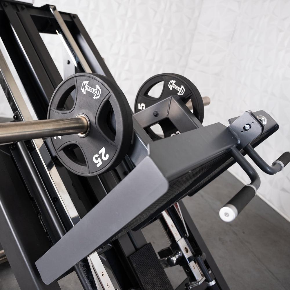ProStrength dual leg press machine with 25-lb weight plates.