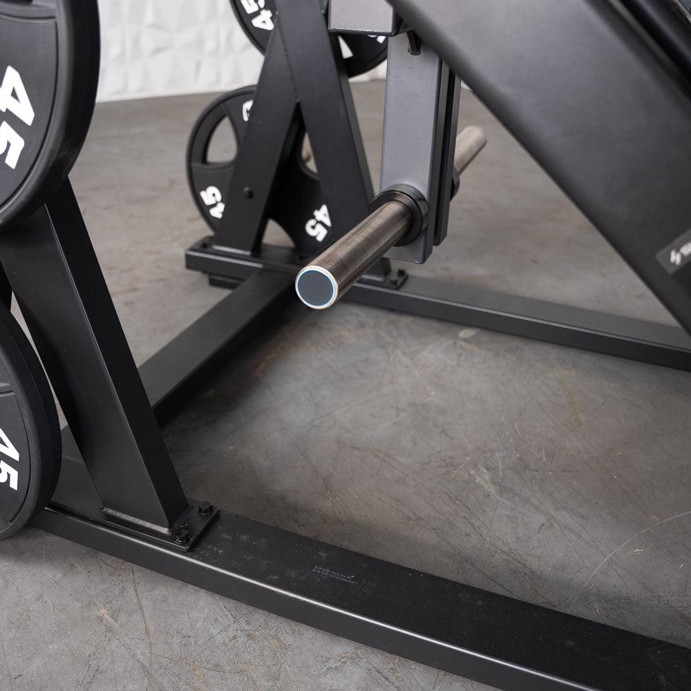 ProStrength dual leg press machine with weight plates and foot bar.