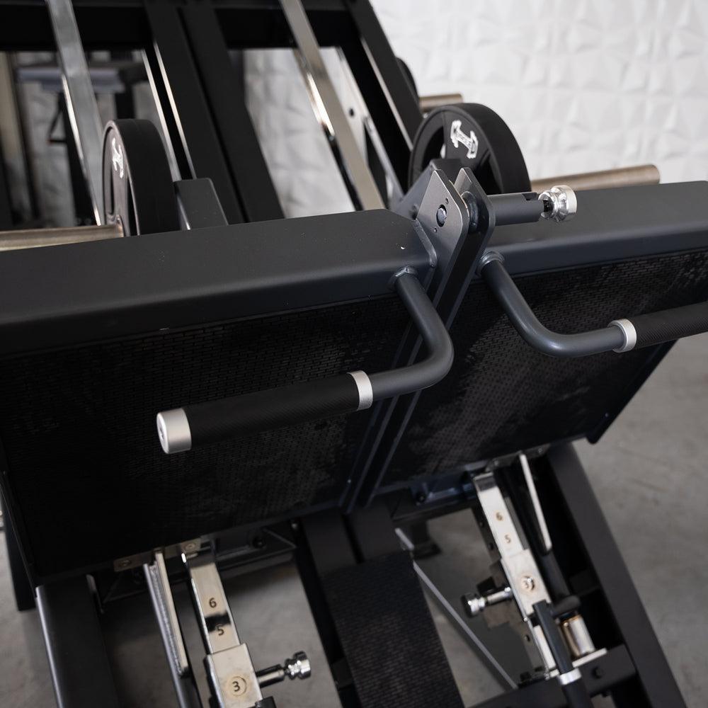 ProStrength Dual Leg Press machine with dual levers and weight plates.