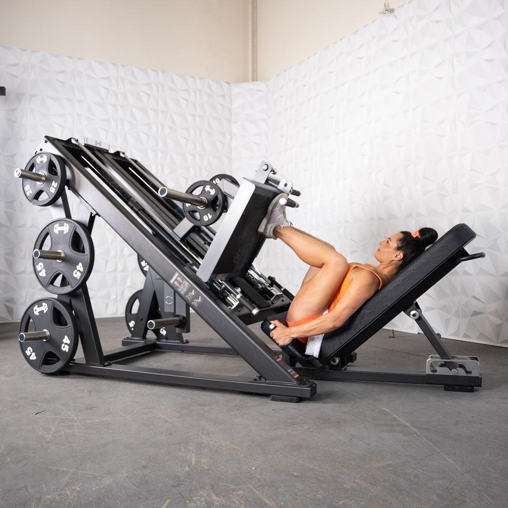 Athlete performing leg press on ProStrength dual leg press machine.