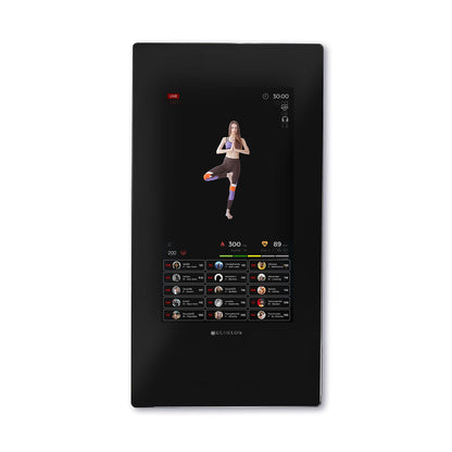 Echelon Reflect 50 Smart Fitness Mirror displaying a live workout session with a female instructor demonstrating an exercise, along with fitness metrics and participant rankings on the screen.