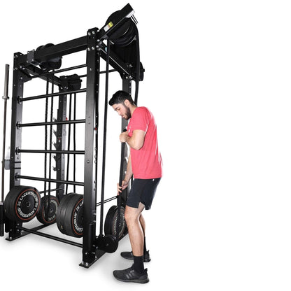 Man using InertiaWave exercise equipment in a red shirt and black shorts.