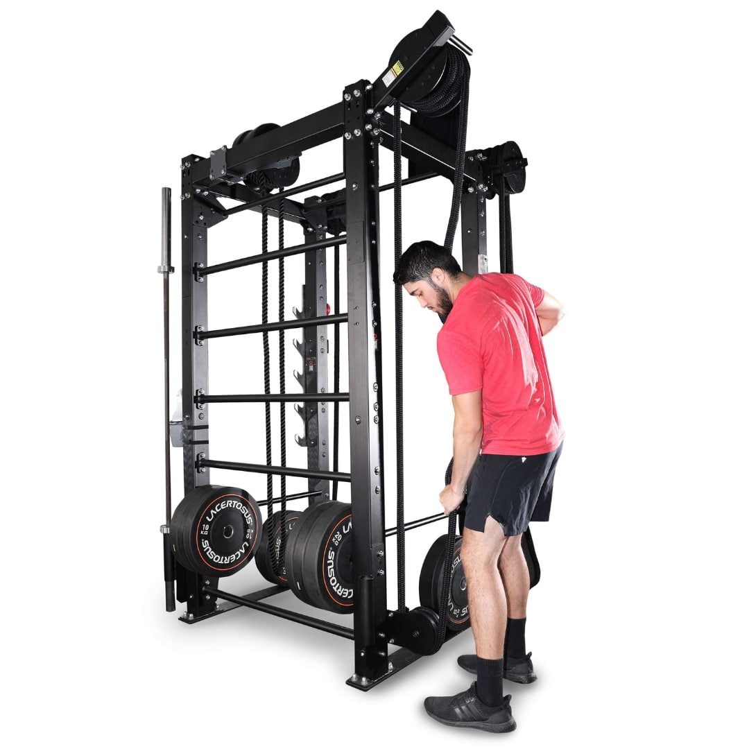 Man using Lacertosus Smith Machine with black weight plates for strength training.