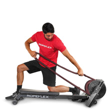 Man using ROPEFLEX exercise machine with red ropes for strength training.