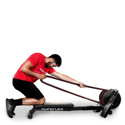 Man exercising on ROPEFLEX machine with red rope for strength training.