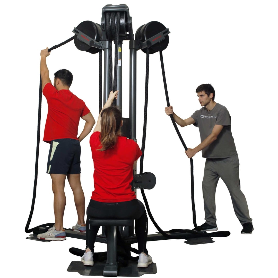 Three people using a Roflex rope training machine for fitness exercises.