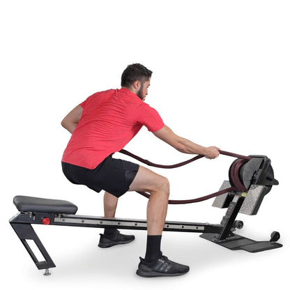 Man using black rope fitness trainer in red shirt for strength workout.