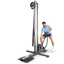 Ropeflex RX2100 exercise machine with man demonstrating rope workout.