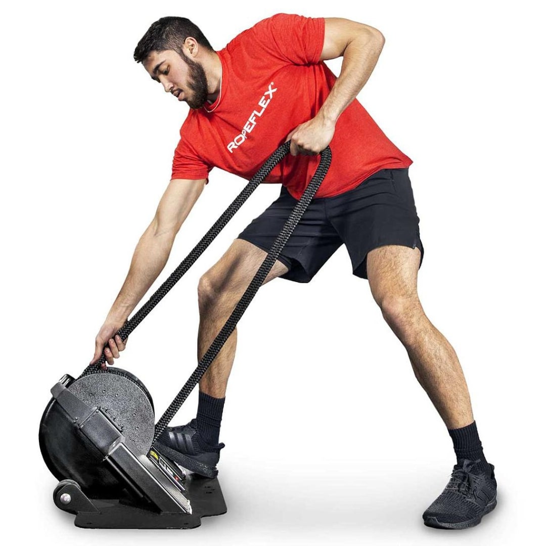 Man exercising with ROPEFLEX RX2100 rope machine in a red shirt.