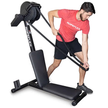 Man using Ropeflex rope trainer in red shirt for strength training.
