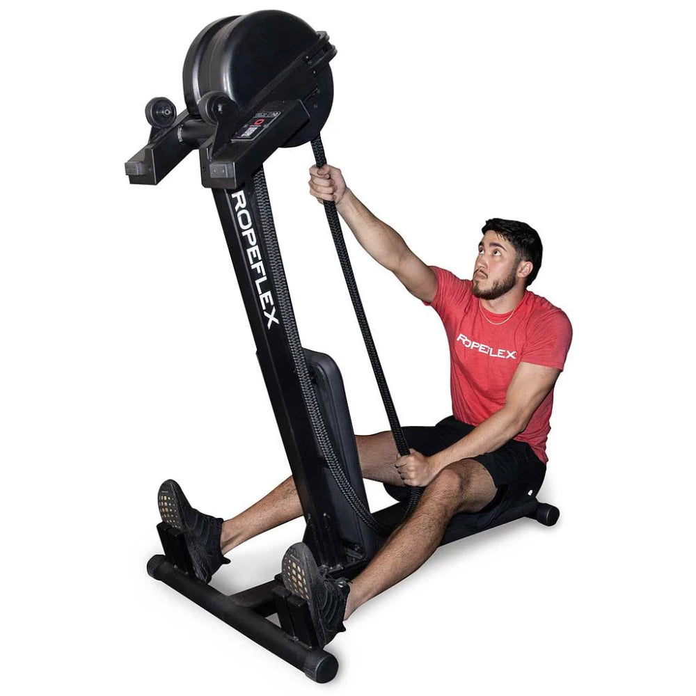 Man using ROPEFLEX RX4400 rope trainer in red shirt, seated position.