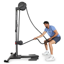 Man using Ropeflex RX2300 vertical rope trainer for fitness workout.