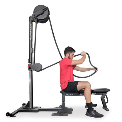 Ropeflex RX4400 rope trainer with seated user in red shirt, showcasing versatile fitness equipment.