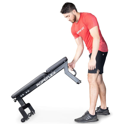 Ropeflex adjustable bench with wheels, man in red shirt adjusting height.