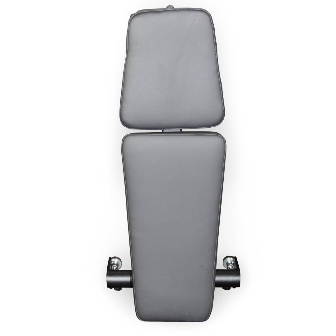 Gray adjustable weight bench with padded backrest and seat for home gym use.
