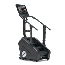STEPR – front-left view of compact smart stair climber with bright LED console, cushioned rotating steps, and slim footprint for home gyms