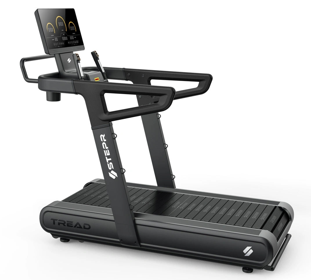 STEPR All-In Tread XL – treadmill folded upright against wall, illustrating hydraulic lift and space-saving vertical storage