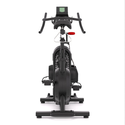 STEPR Cycle XL – rear perspective showing ventilated flywheel cover, transport wheels, and wide stabilizer feet