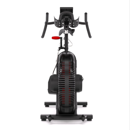 STEPR Cycle XL – athlete riding bike during high-intensity interval workout demonstrating smooth, quiet pedal motion