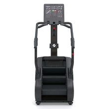 STEPR PRO – straight-on front shot highlighting wide handrails, bright LED console, and compact footprint ideal for fitness studios