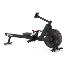 STEPR Rower XL – athlete driving through a powerful stroke on connected rower showcasing smooth glide rail and footplates