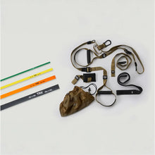 TRX Army ACFT fitness kit with colorful resistance bands and straps.